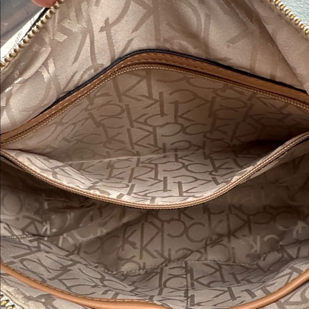 Calvin Klein Logo Print Hobo Bag in Cream and Brown